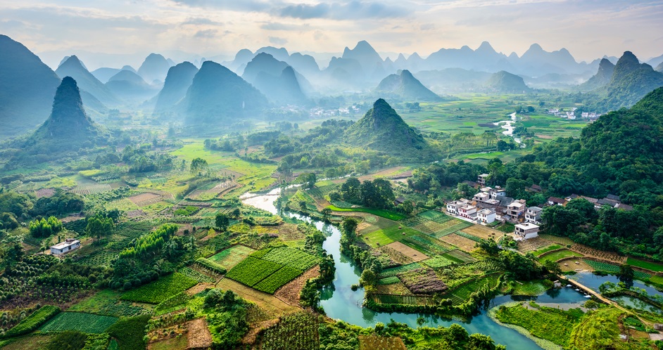 Landscape of mountains, forests and fields in Guilin, China - iStock/IPBES