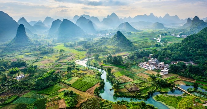 Landscape of mountains, forests and fields in Guilin, China - iStock/IPBES