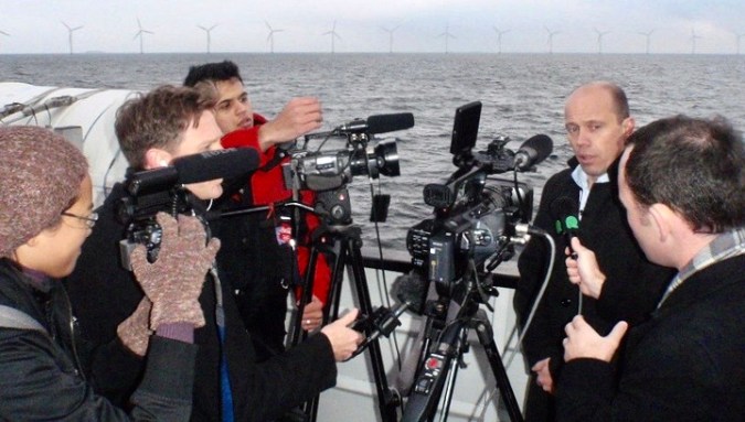 EJN Climate Change Media Partnership Fellows, including Pierre Fitter from India, Gustavo Bonato from Brazil and Pia Faustino from the Philippines, interview a Danish wind energy executive.